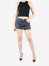 Load image into Gallery viewer, Black frayed denim mini shorts - size 27 Shorts Agolde 
