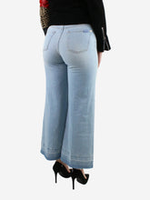 Load image into Gallery viewer, Blue frayed jeans - size W28 Trousers 7 For All Mankind 
