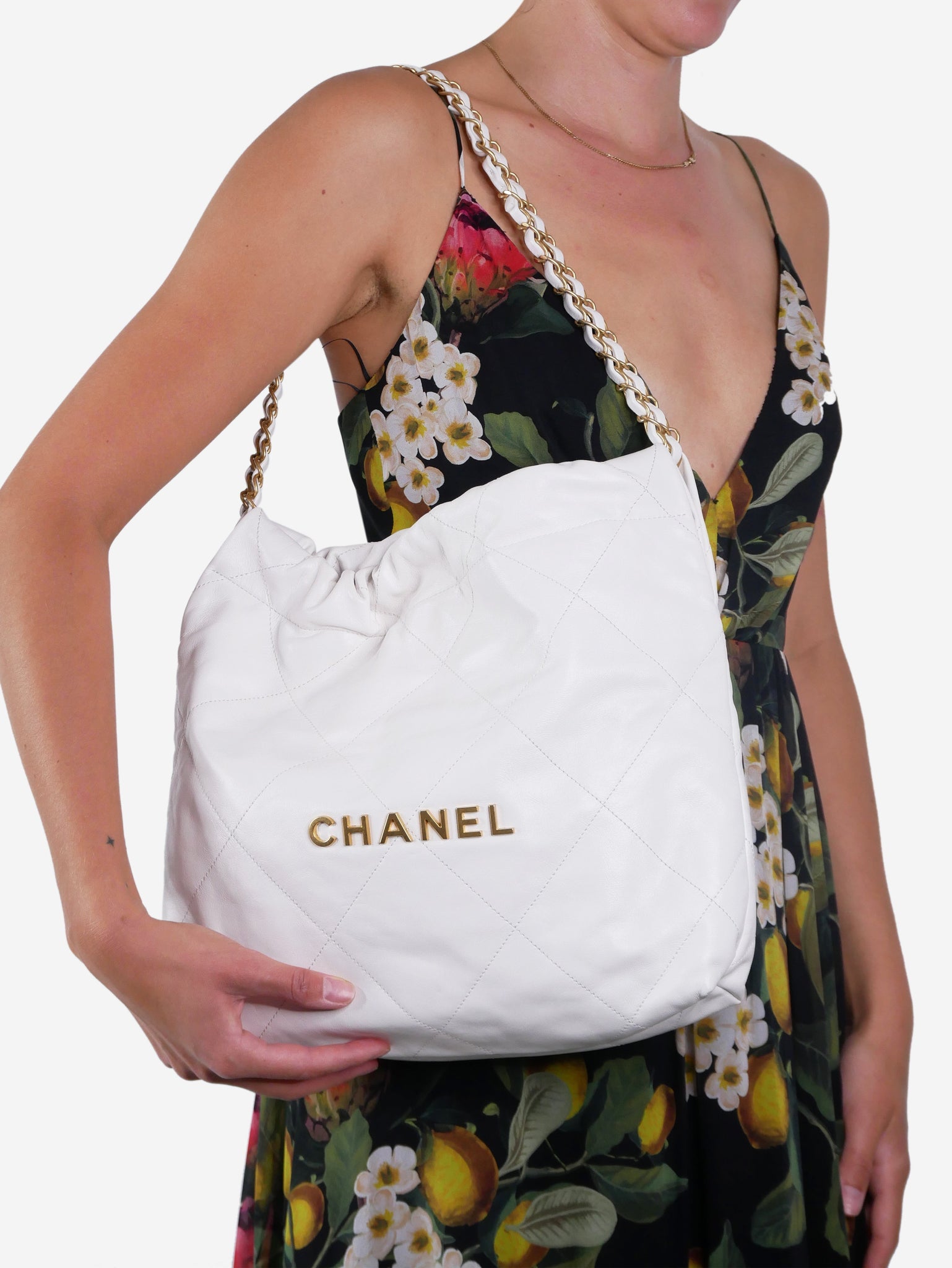 White pre-owned Chanel 22 handbag