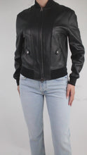 Load and play video in Gallery viewer, Black leather bomber jacket - size FR 36
