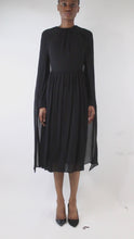 Load and play video in Gallery viewer, Black Sable deep v-neckline pleated dress - Size IT 36

