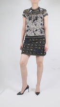 Load and play video in Gallery viewer, Black printed metallic knit dress - size FR 34
