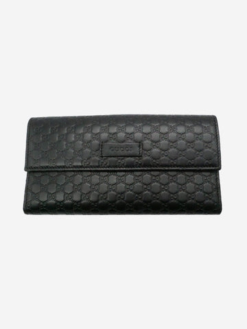 Black embossed monogram flap wallet Wallets, Purses & Small Leather Goods Gucci 