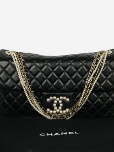 Black pre-owned Chanel quilted shoulder bag with pearl detail